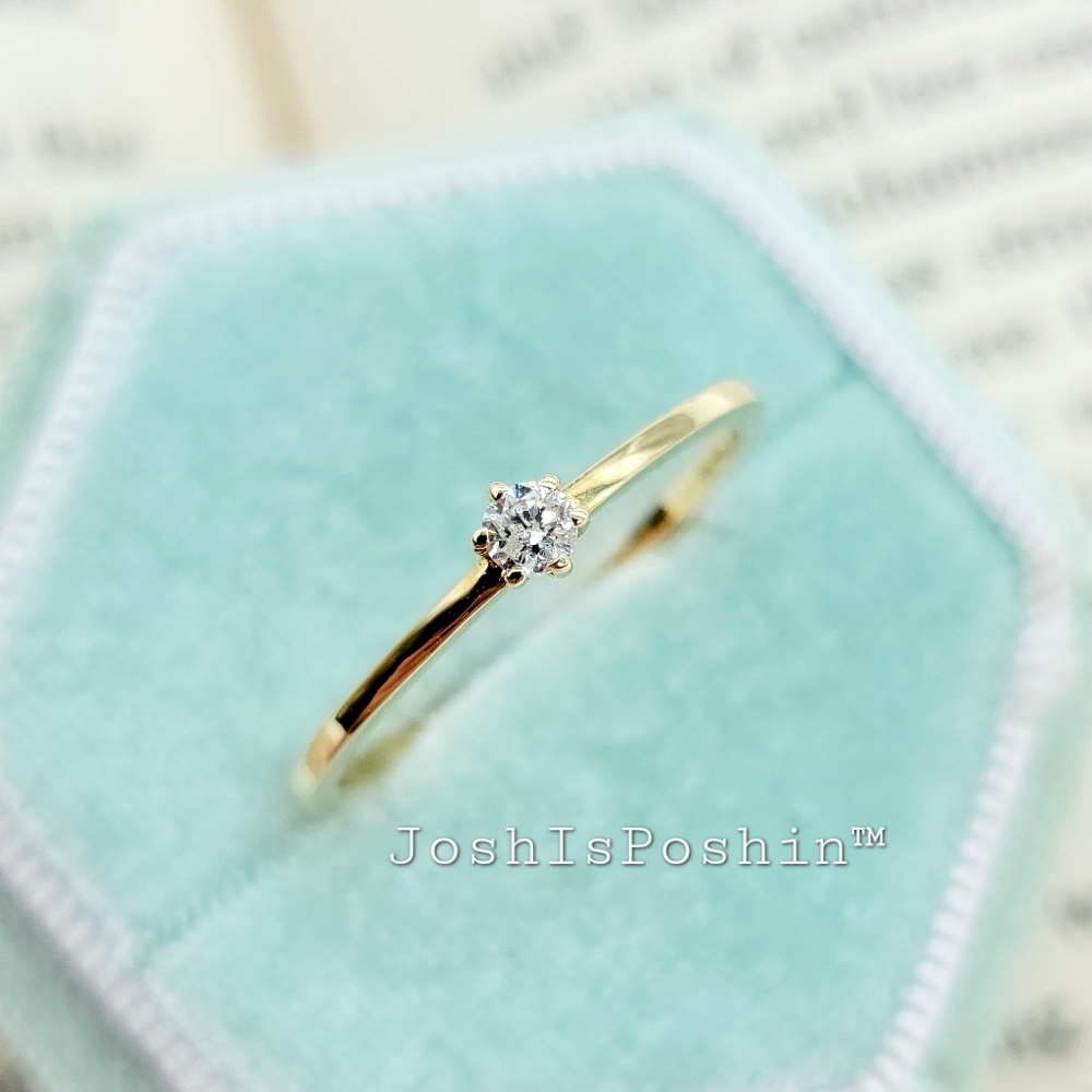 Real 0.05 ct. t.w. natural diamond solitaire engagement ring in 10k yell…